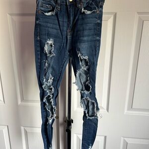 Ripped Women’s Blue Jeans